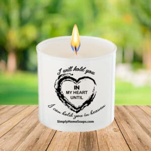 Close Up of ‘I Will Hold You In My Heart Until I Can Hold You In Heaven’ Candle Saying