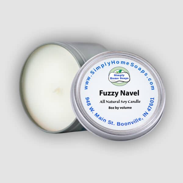 A Fuzzy Navel scented candle with an open lid