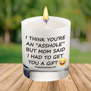 Close Up of ‘I Think You’re an Asshole but Mom Said I Have to Get You a Gift’ Candle Saying